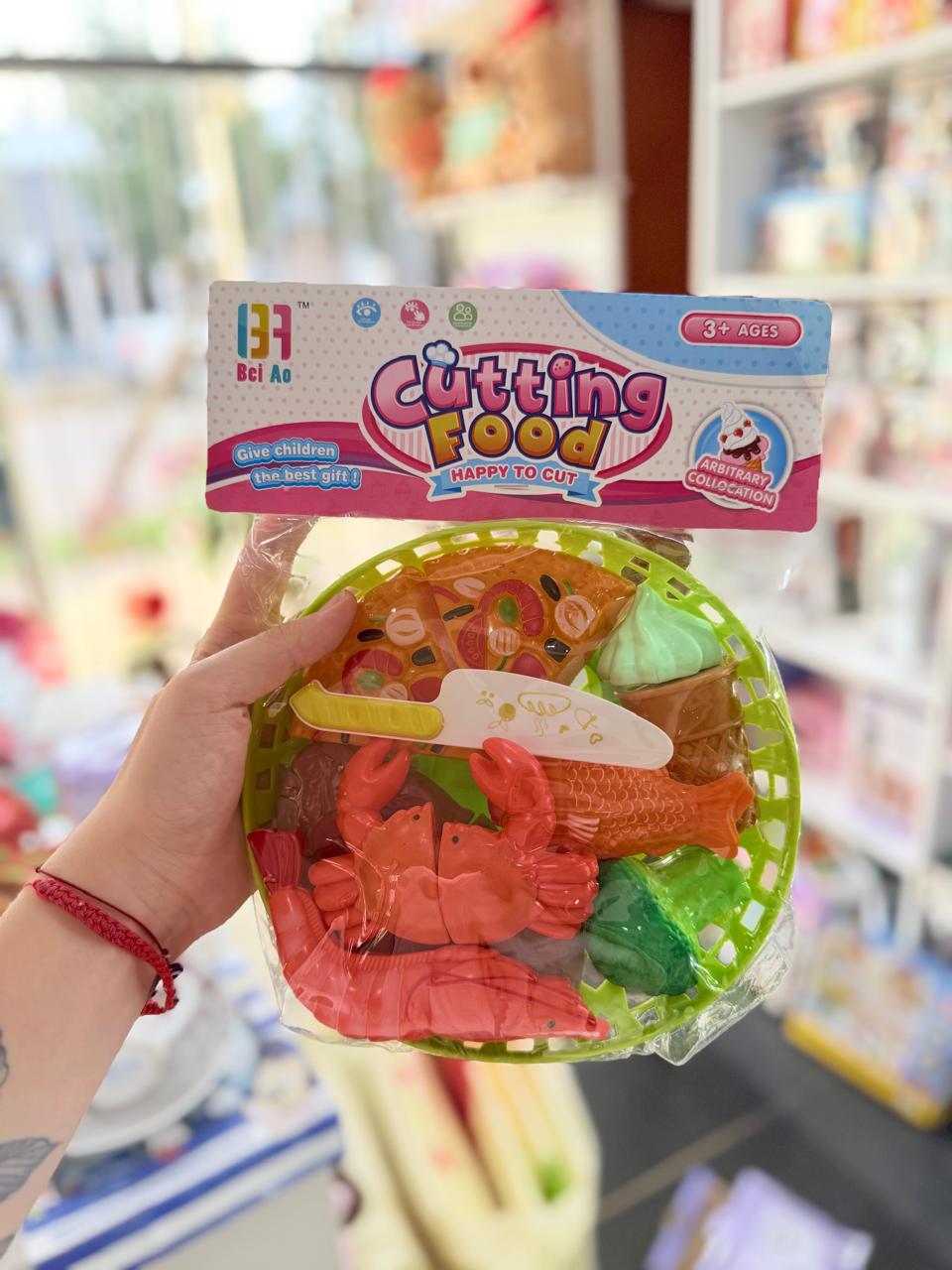 Juego de cortar alimentos